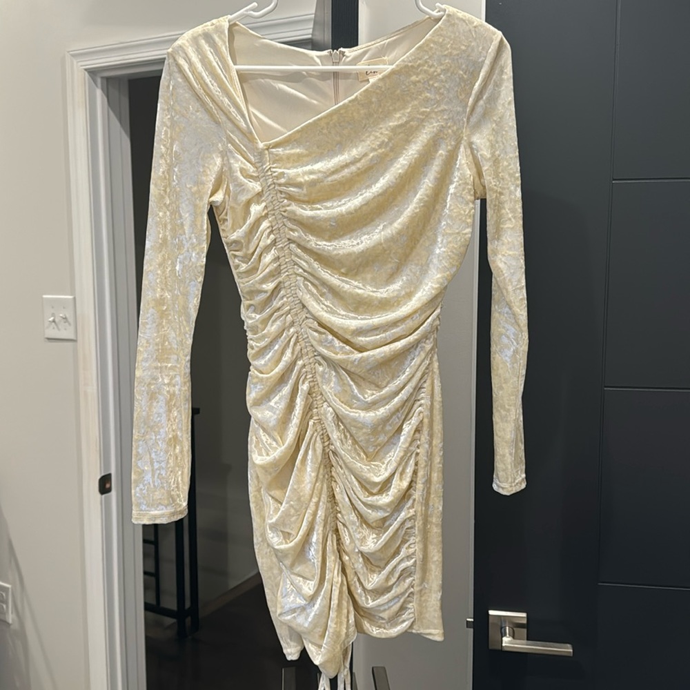 Long-sleeve cream colored velvet mini dress